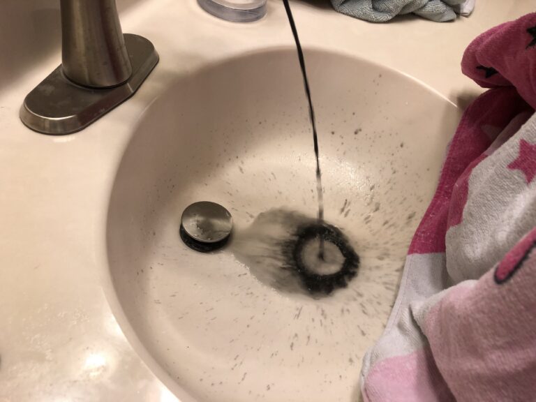 black water coming out of faucet